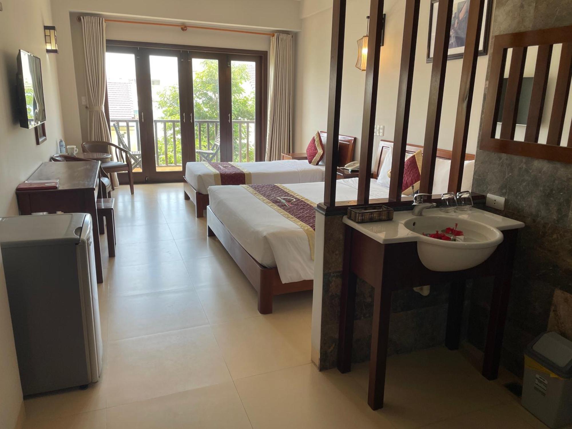 Отель Sunshine Hoian Хойан